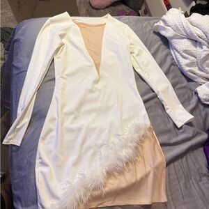Elegant White Dress with Feather Detail